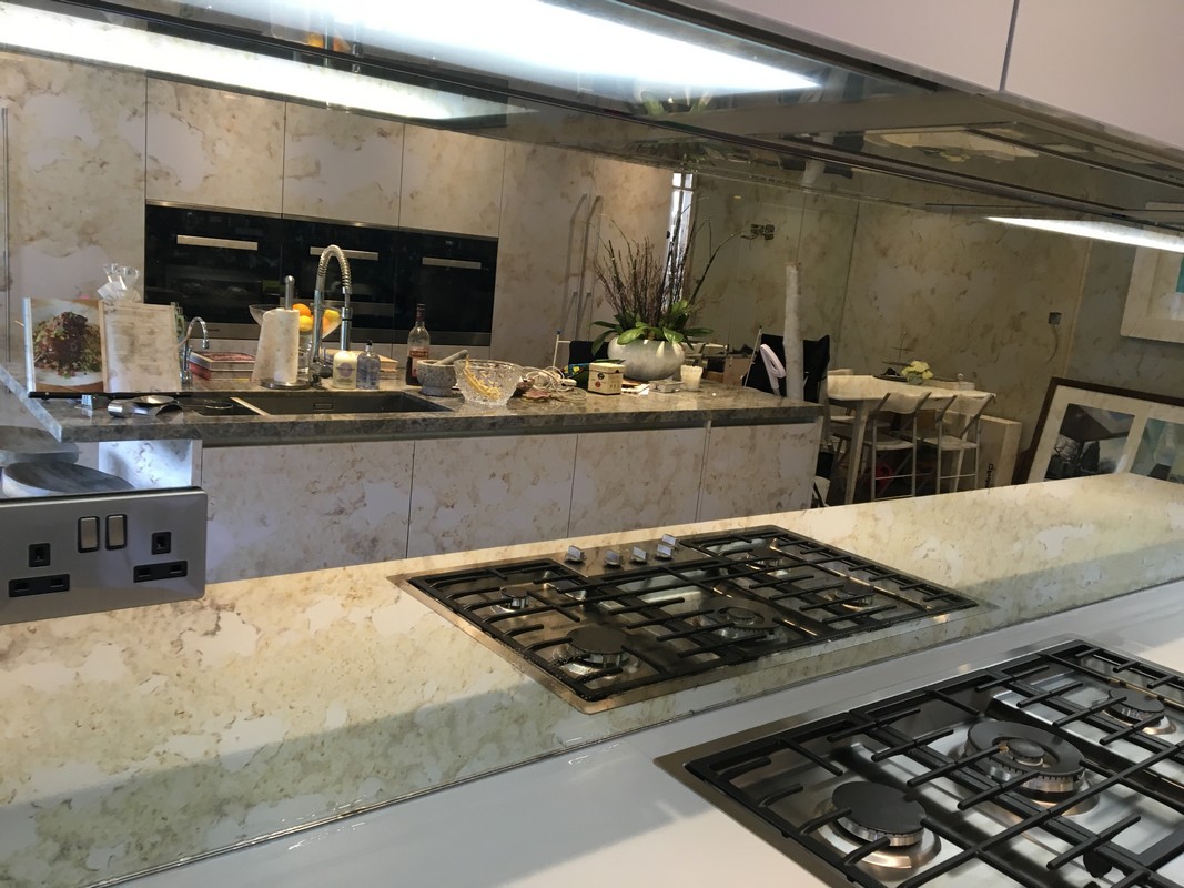 Mirror glass splashback in Chingford luxury kitchen