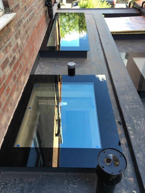 Multiple flat roof skylights on extension in Chingford