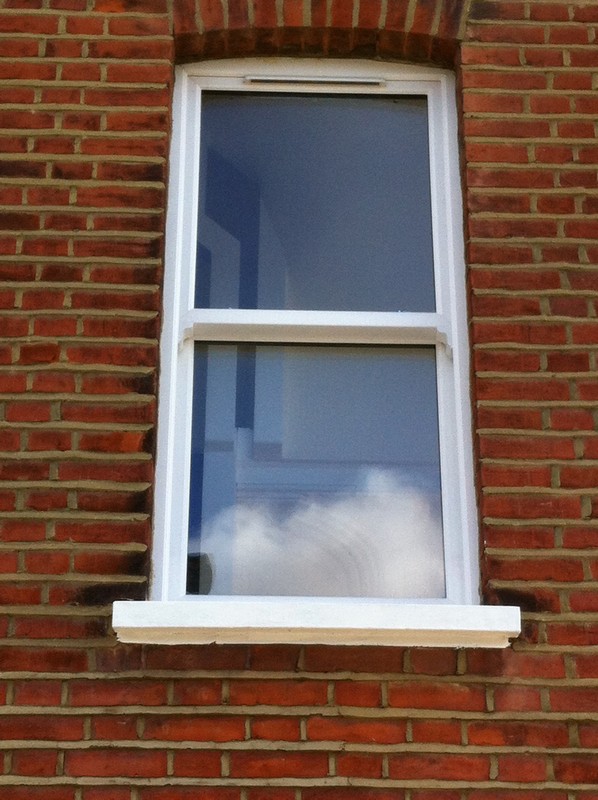 uPVC sash window on Victorian red brick house in Chingford